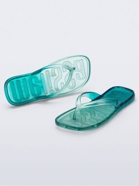 New in box. Melissa beach flip-flop size 7